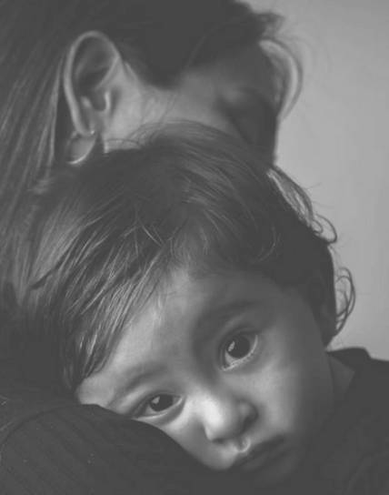 playmaker holding a child