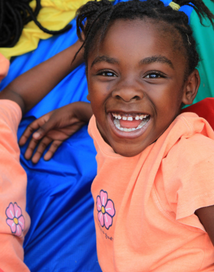 young child laughing